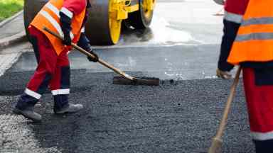 Asphalt aufbringen